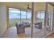 Spacious screened balcony with lake and golf course views at 6360 Watercrest Way # 203, Lakewood Ranch, FL 34202