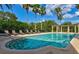 Relaxing pool area with lounge chairs at 6360 Watercrest Way # 203, Lakewood Ranch, FL 34202