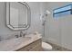 Small bathroom with shower and marble vanity at 2197 Nita Ter, North Port, FL 34286