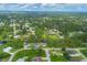 Aerial view of community homes near a waterway at 2197 Nita Ter, North Port, FL 34286