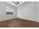 Bright bedroom with wood floors and window blinds at 2197 Nita Ter, North Port, FL 34286