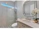 Bathroom with walk-in shower and marble vanity at 2197 Nita Ter, North Port, FL 34286
