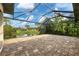 Spacious screened patio overlooking a tranquil waterway at 2197 Nita Ter, North Port, FL 34286