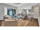 Relaxing Gathering room with views of the kitchen and backyard lanai at 2197 Nita Ter, North Port, FL 34286
