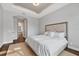 Spacious bedroom with plush bedding and ensuite bathroom at 2197 Nita Ter, North Port, FL 34286
