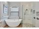 Spa-like bathroom with soaking tub and walk-in shower at 2197 Nita Ter, North Port, FL 34286