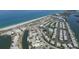 Aerial view of waterfront community with beach and canal access at 2197 Nita Ter, North Port, FL 34286