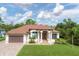 House exterior featuring Mediterranean-style architecture at 2197 Nita Ter, North Port, FL 34286