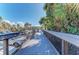 Elevated boardwalk offering scenic views and access to parking at 872 Saranac Lake Dr # 202, Venice, FL 34292