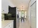 Kitchen boasts stainless steel appliances and an adjacent dining area at 872 Saranac Lake Dr # 202, Venice, FL 34292