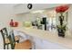 Kitchen with breakfast bar and modern appliances at 872 Saranac Lake Dr # 202, Venice, FL 34292