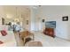 Open living area with views to kitchen and dining at 872 Saranac Lake Dr # 202, Venice, FL 34292