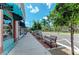 Quaint street scene with shops and benches, creating a welcoming atmosphere at 872 Saranac Lake Dr # 202, Venice, FL 34292