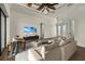 Bright living room with comfy seating and access to exterior at 15060 Aquarius Cir, Port Charlotte, FL 33981