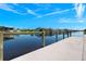 Concrete dock providing direct water access to the canal at 15060 Aquarius Cir, Port Charlotte, FL 33981