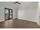 Spacious bonus room with sliding glass doors leading to outdoor kitchen at 15060 Aquarius Cir, Port Charlotte, FL 33981