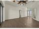 Bright and spacious living room with hardwood floors and natural light at 15060 Aquarius Cir, Port Charlotte, FL 33981