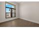 Spacious bedroom with large window and hardwood floors at 15060 Aquarius Cir, Port Charlotte, FL 33981