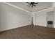 Primary bedroom with hardwood floors and access to bathroom at 15060 Aquarius Cir, Port Charlotte, FL 33981