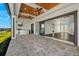 Large covered patio with water views and access to interior living space at 15060 Aquarius Cir, Port Charlotte, FL 33981