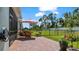 Brick paver patio perfect for outdoor dining and relaxation at 248 Ibiza Loop, Venice, FL 34292