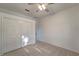 Well-lit bedroom with double door closet and ceiling fan at 5847 Wilson Rd, Venice, FL 34293