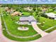 Aerial view showcasing a single-Gathering house with a large yard at 5076 Kingsley Rd, North Port, FL 34287