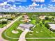 Aerial view of a home with a large yard in a residential area at 5076 Kingsley Rd, North Port, FL 34287