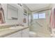 Updated bathroom with walk-in shower and stylish vanity at 5076 Kingsley Rd, North Port, FL 34287