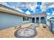Front entry with arched walkway and stone detailing at 5076 Kingsley Rd, North Port, FL 34287
