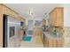 Updated kitchen with stainless steel appliances and granite countertops at 5076 Kingsley Rd, North Port, FL 34287