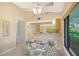 Kitchen with breakfast nook and view of the backyard at 338 Pembroke Dr # 208, Venice, FL 34293