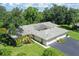 Single-story home with private drive and lush landscaping at 338 Pembroke Dr # 208, Venice, FL 34293