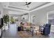 Spacious living area with open concept to kitchen at 12760 Brookgreen St, Venice, FL 34293