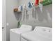 Laundry room with washer, dryer, and shelving at 12760 Brookgreen St, Venice, FL 34293