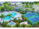 Aerial view of community pool, tennis courts, and spa at 12760 Brookgreen St, Venice, FL 34293