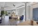 Spacious living area with open concept design, showcasing kitchen and entryway at 12760 Brookgreen St, Venice, FL 34293