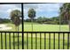 Stunning golf course view from screened balcony at 929 Capri Isles Blvd # 22, Venice, FL 34292