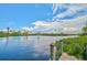 Scenic waterfront view with lush vegetation and calm waters at 412 Cezanne Dr, Osprey, FL 34229