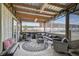 Covered patio with comfortable seating, perfect for relaxing at 27000 Harrison Rd, Sidell, FL 34266