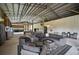 Barn game room with pool table and comfortable seating at 27000 Harrison Rd, Sidell, FL 34266