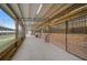Multiple horse stalls in a well maintained barn at 27000 Harrison Rd, Sidell, FL 34266