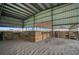 Open barn with multiple stalls and sand floor at 27000 Harrison Rd, Sidell, FL 34266
