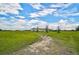 Ranch-style home on spacious lot with lush lawn at 27000 Harrison Rd, Sidell, FL 34266