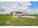 Metal building and RV hookups, ideal for storage and recreation at 27000 Harrison Rd, Sidell, FL 34266