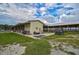 Equestrian barn with tack room and ATV at 27000 Harrison Rd, Sidell, FL 34266