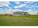 Ranch home on a large lot with covered porch at 27000 Harrison Rd, Sidell, FL 34266