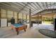 Barn game room with pool table and storage at 27000 Harrison Rd, Sidell, FL 34266