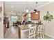 Spacious kitchen with granite countertops, stainless steel appliances, and an island at 12261 Canavese Ln, Venice, FL 34293