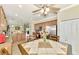 Bright kitchen with an island, granite counters, and stainless steel appliances at 12261 Canavese Ln, Venice, FL 34293
